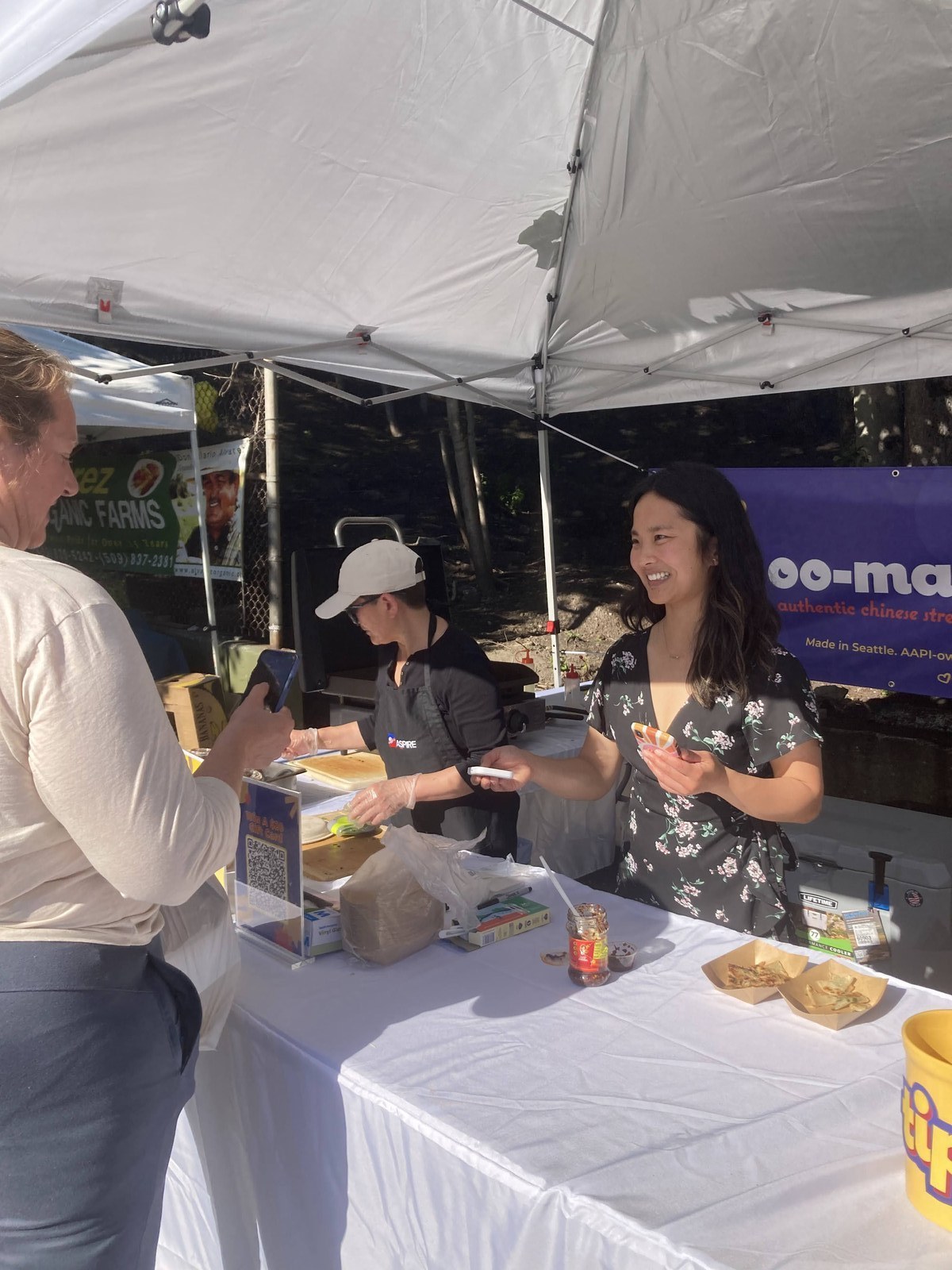 Jen serving a customer